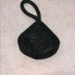 Cache dark green evening bag